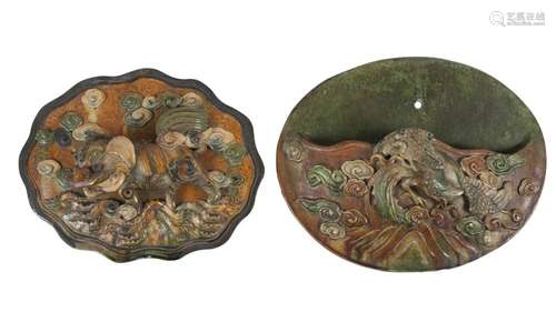 Two Chinese Ming style sancai glazed earthenware oval wall plaques