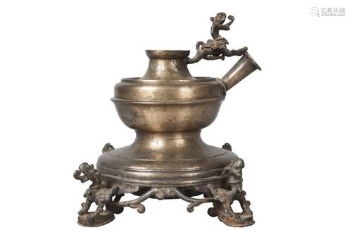 A Nepalese brass lamp base