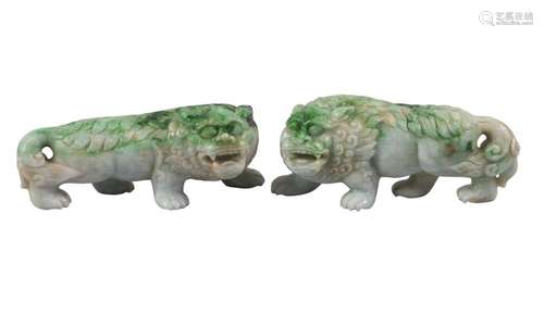 A pair of Chinese green hardstone lions