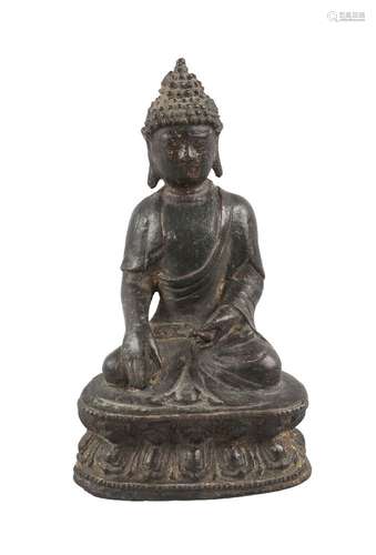 A Chinese bronze figure of Shakyamuni Buddha