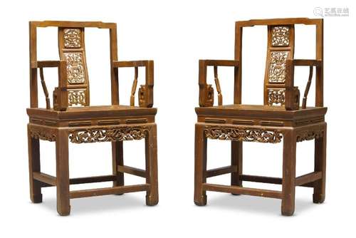 A pair of Chinese hardwood armchairs