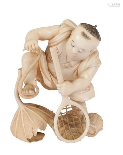 A Japanese ivory okimono