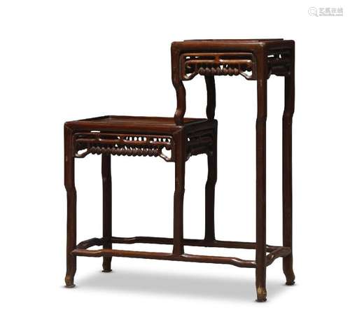 A Chinese hardwood two tier stepped stand