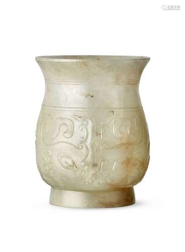 A Chinese pale green jade archaistic pear-shaped vase