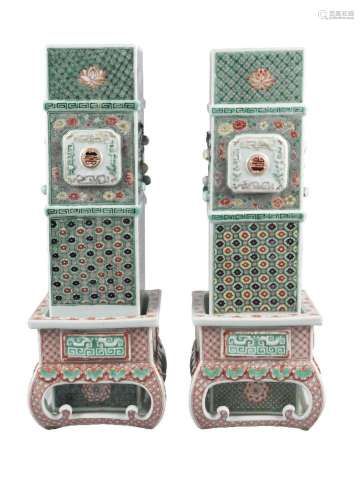 A rare pair of Chinese porcelain square vases and stands