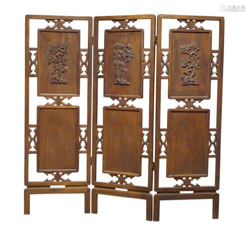 A Chinese hardwood 'Three Friends of Winter' three section two fold screen