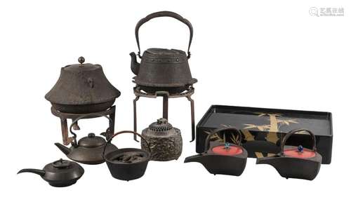 Six Japanese bronze and cast iron kettles