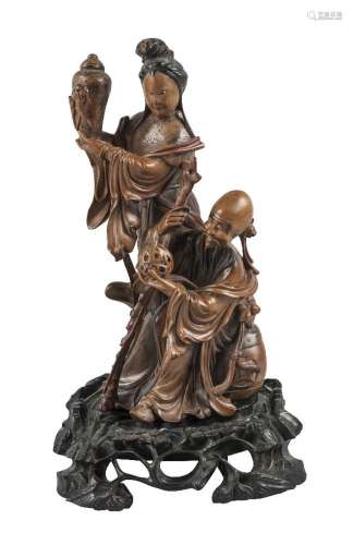 A Chinese carved softwood figure group