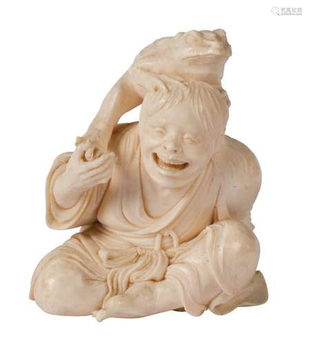 A Japanese ivory okimono depicting Liu Hai and his three-legged toad