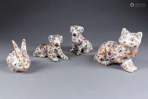 Chiens, Chat et Lapin. Quatre animaux en porcelain...