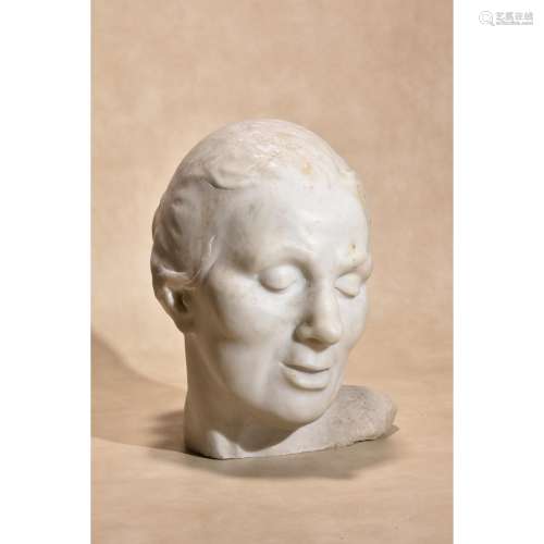 A sculpted white marble head of a woman