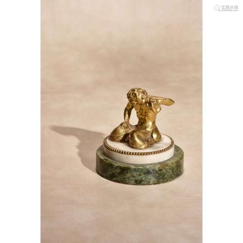 A Continental gilt bronze and marble mounted model of a triton
