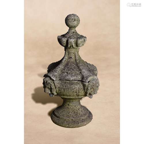 A stone composition pier finial modelled as an urn in Renaissance style