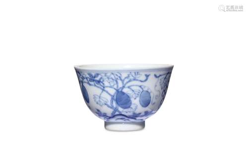 A CHINESE BLUE AND WHITE CUP. Delicately painted w