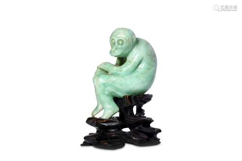 A CHINESE JADEITE ‘MONKEY’ CARVING. Early 20th Cen