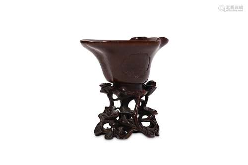 A CHINESE RHINOCEROS HORN LIBATION CUP. Qing Dynas