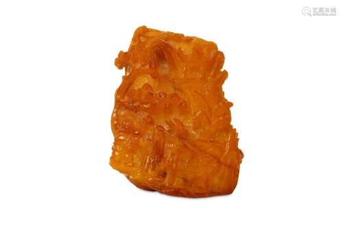 A CHINESE AMBER ‘MOUNTAIN LANDSCAPE’ CARVING. Qing