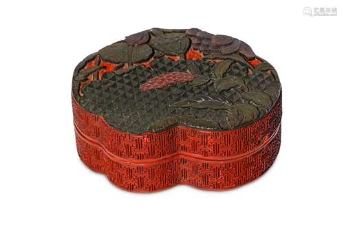 A CHINESE THREE-COLOUR CINNABAR LACQUER 'LOTUS' FLOWER BOX AND COVER. Qing Dynasty, 18th Century. Of