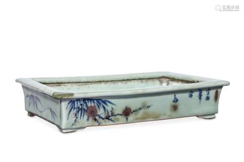 A CHINESE CELADON-GROUND GLAZED BLUE AND RED GLAZED JARDINIERE. Decorated with the free friends of