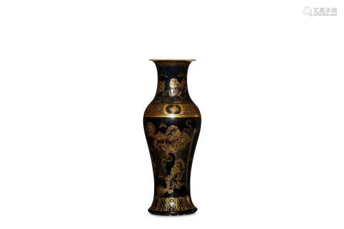 A CHINESE GILT-DECORATED BLACK GLAZED BUDDHIST LION VASE. Qing Dynasty. Of baluster from, the body