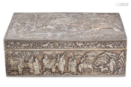 A CHINESE EXPORT SILVER BOX. Circa 1900. Of rectangular form, heavily cast, the cover modelled