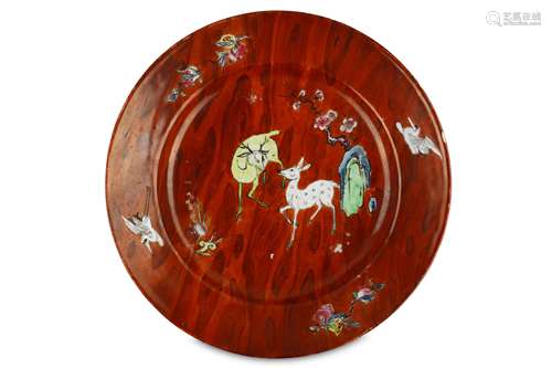 A CHINESE FAUX-BOIS GROUND FAMILLE ROSE 'DEERS' DISH. Qing Dynasty, Yongzheng era. Decorated with a