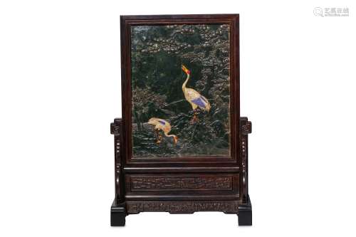 A CHINESE HARDSTONE-INLAID SPINACH JADE TABLE SCREEN. Inlaid with nephrite and to depict two cranes
