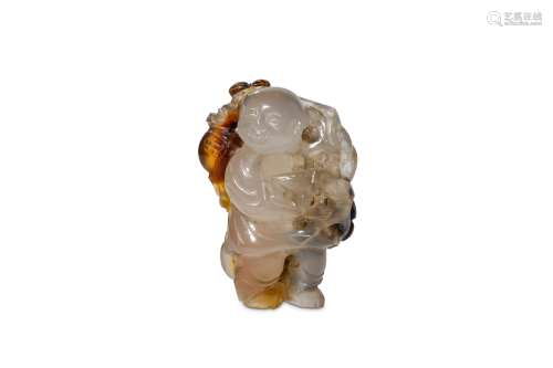 A CHINESE AGATE CARVING OF A BOY. Qing Dynasty, 18