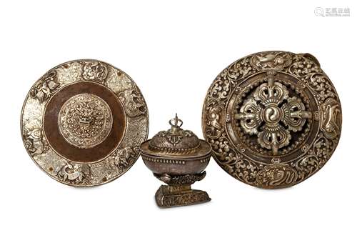 TWO WHITE METAL PLAQUES AND A KAPALA. Tibet 19th /