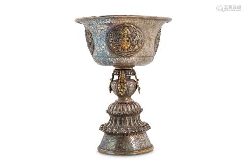 A SILVER BUTTER LAMP. Tibet, 19th Century.