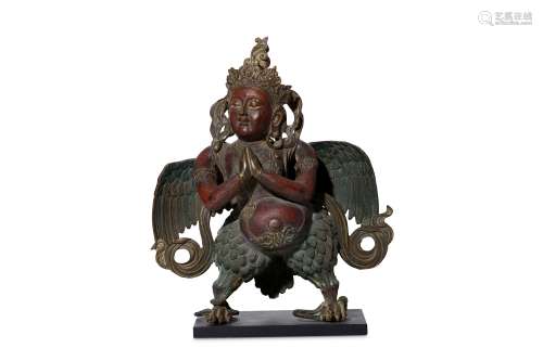 A LACQUERED BRONZE WINGED DEITY FIGURE. 33cm H. 銅漆