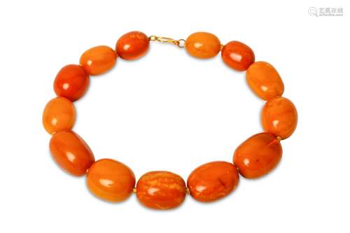 AN AMBER NECKLACE.