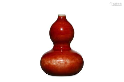 A CHINESE COPPER-RED GLAZED DOUBLE GOURD VASE. Qin