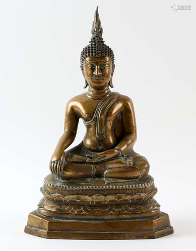 Tibetan cast bronze figure of Buddha seated in full lotus position with hands in Bhumiparsha