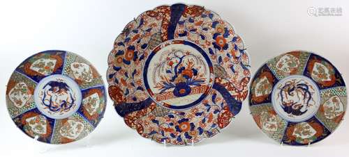 Japanese Imari charger decorated with panels of flowers and foliage, 45.5cm diameter, and a pair