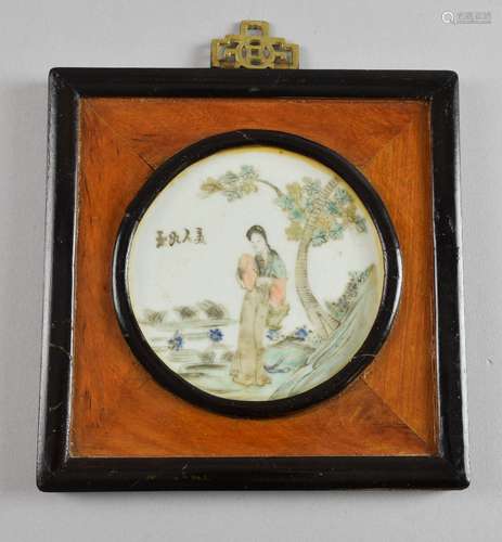 Chinese circular porcelain plaque decorated with a lady in a garden and calligraphy, 9.7cm