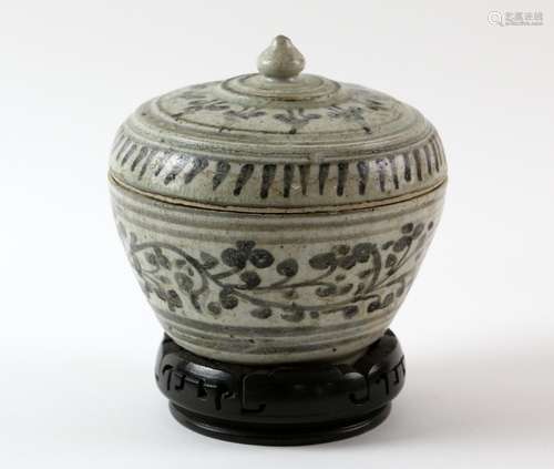 Thai, Sawankalok underglaze painted jar and cover with floral and foliate decoration, 10cm high,