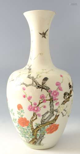 Chinese famille rose vase painted and enamelled in colours with four birds in blossoming shrubs with