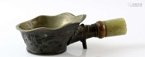 Chinese bronze wine vessel with moulded dragon decoration and green jade handle, 14.5cm long,