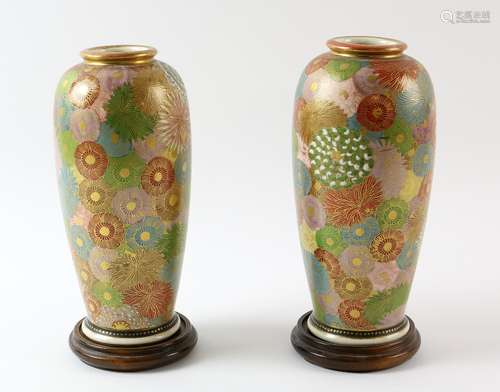 Pair of Japanese vases of elongated ovoid form painted and enamelled with chrysanthemums,