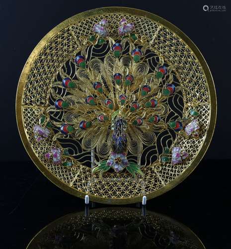 Gilt metal, filigree and enamel dish decorated with a peacock, 20.5cm diameter,