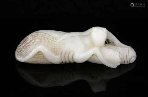 Chinese pale celadon jade chop stick rest carved as a grasshopper with two grubs between it's