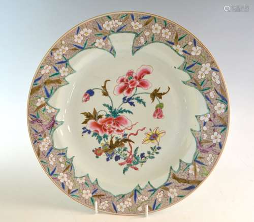 18th century Chinese famille rose porcelain charger decorated with flowers within a floral and