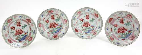 Set of four Chinese famille rose plates decorated with flowers and foliage, 22.5cm diameter,