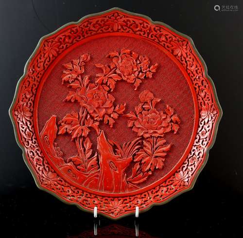 20th century Chinese red cinnabar lacquered dish with serpentine metal mounted rim, decorated with