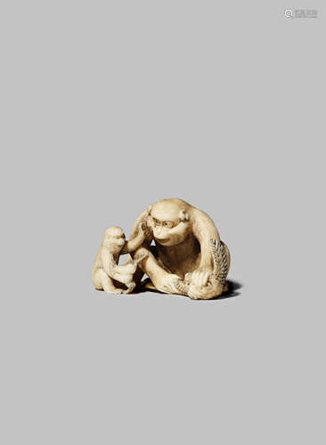 A JAPANESE IVORY NETSUKE MEIJI 1868-1912 Carved as a monkey and its young, both seated and playing