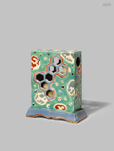 A JAPANESE KYOTO WARE JOSS STICK HOLDER EDO 1603-1868 The rectangular body decorated with abstract