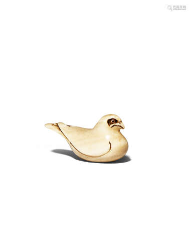 A JAPANESE IVORY NETSUKE MEIJI 1868-1912 Of simplified form and carved as a pigeon or a hawk, the