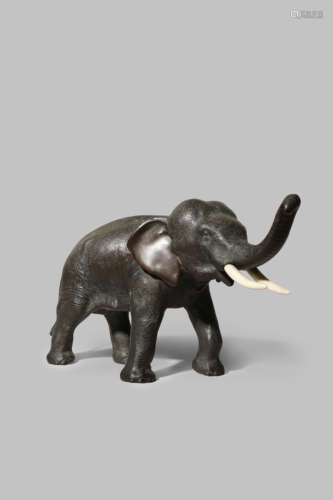 A JAPANESE BRONZE MODEL OF AN ELEPHANT, OKIMONO MEIJI 1868-1912 The pachyderm standing four-square