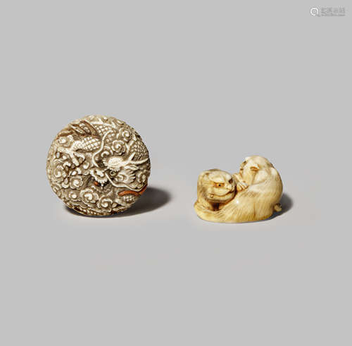 TWO JAPANESE IVORY NETSUKE MEIJI 1868-1912 One a manju densely carved with two writhing dragons